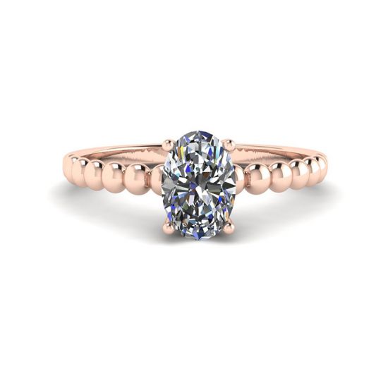 Diamante ovalado en anillo de oro rosado de 18 quilates con cuentas
