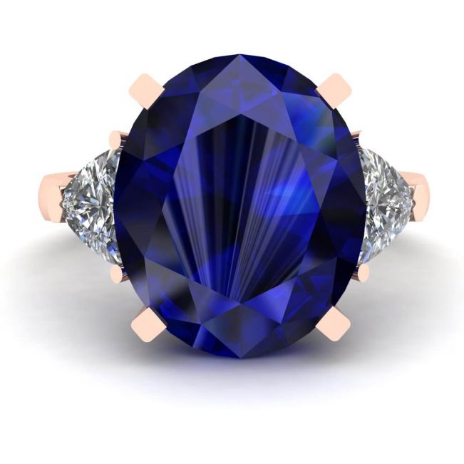 Anillo de tres piedras con zafiro en oro rosa