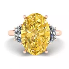 Diamante amarillo ovalado con media luna lateral Diamantes blancos Oro rosado