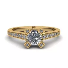 Anillo de diseño con diamante redondo y pavé en oro amarillo de 18 quilates