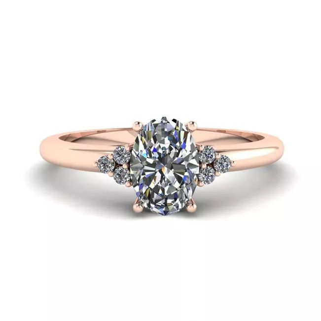 Anillo de diamantes ovalados con 3 diamantes laterales en oro rosa