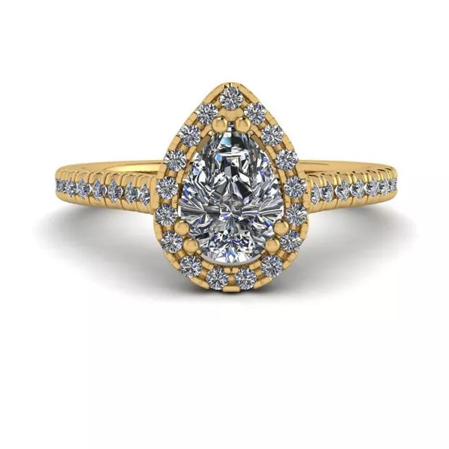 Anillo con halo de diamantes de talla pera en oro amarillo de 18 quilates