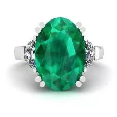 Anillo de esmeralda ovalada con diamantes laterales en forma de media luna