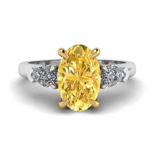 Anillo de diamante amarillo ovalado con diamantes blancos de pera laterales