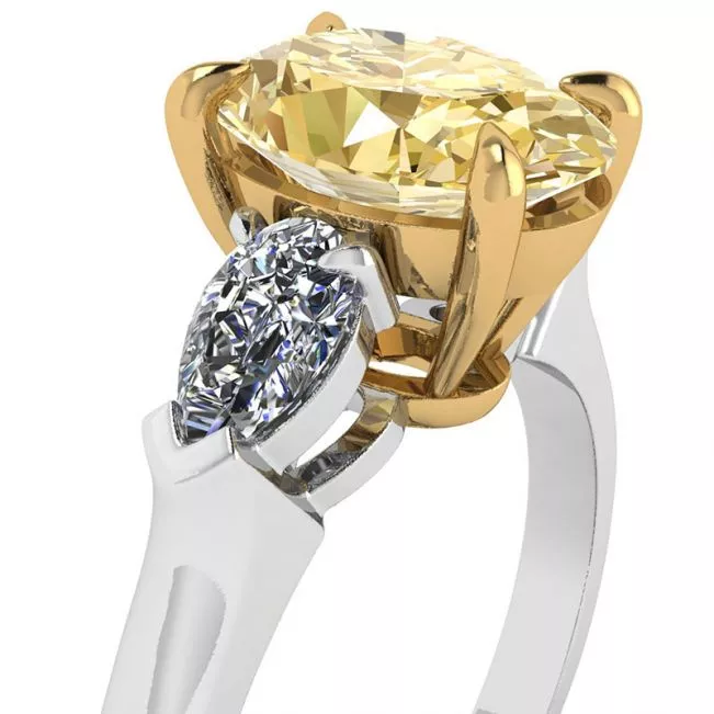 Anillo de diamante amarillo ovalado con diamantes blancos de pera laterales - Photo 1